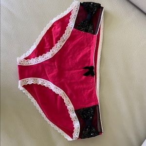 NWOT panties with sequin bows on each side